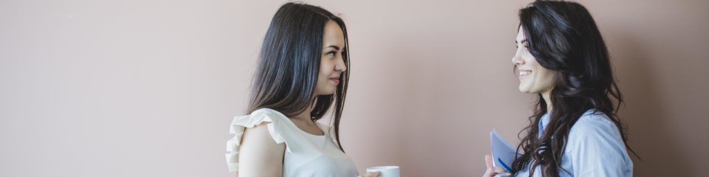 women chatting during break time