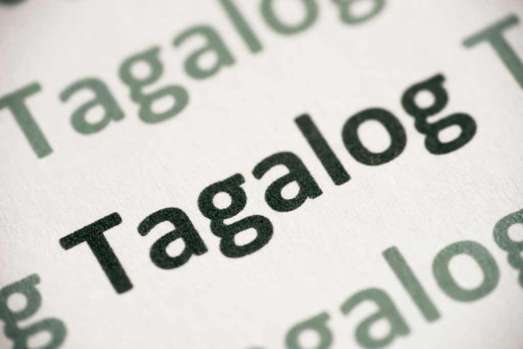 word Tagalog language printed on paper macro