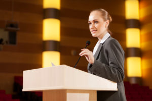 public speaker on podium