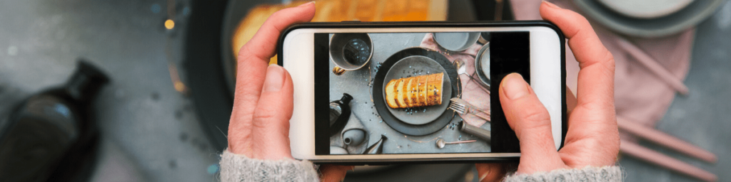 female-hands-taking-pictures-for-instagram-food-blogger-concept