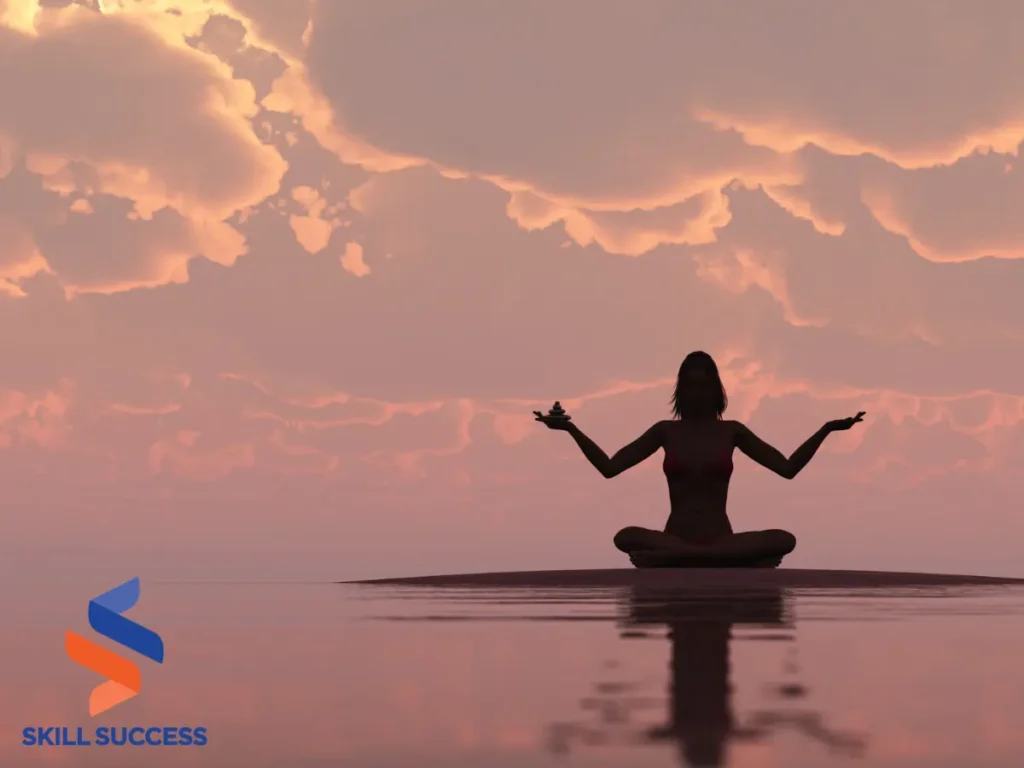 A woman meditates peacefully in water, surrounded by tranquility