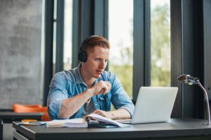 featured-image-student-studying-with-books-and-laptop