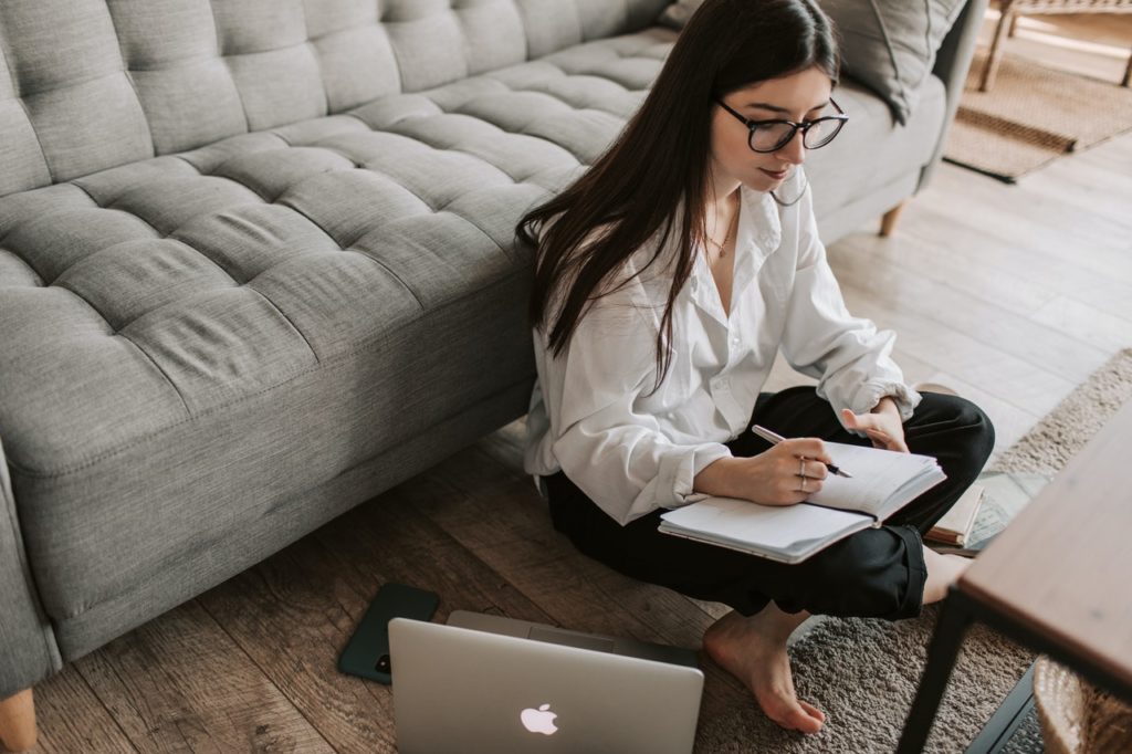 entrepreneur taking business course through laptop