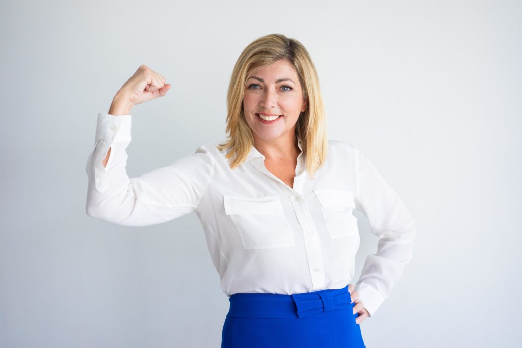 featured-image-confident-caucasian-business-woman-flexing-bicep