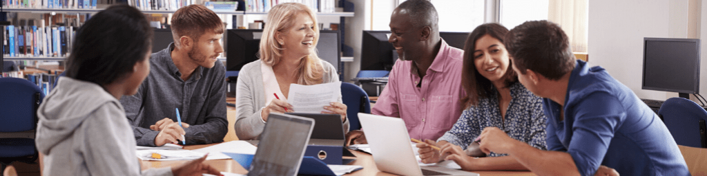 group-of-mature-college-students-collaborating-on-project
