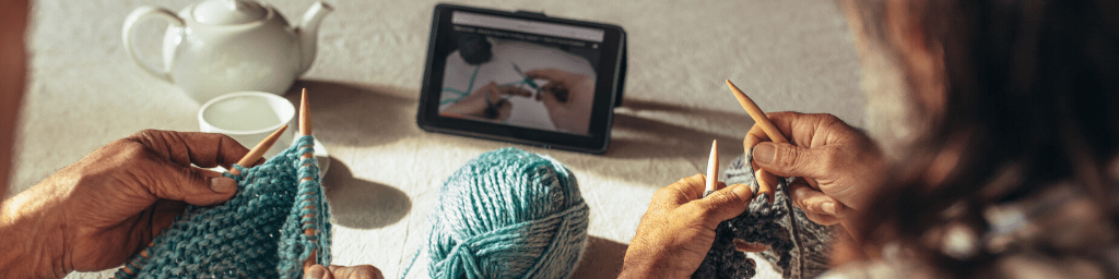 retired-people-learning-knitting-from-online-videos