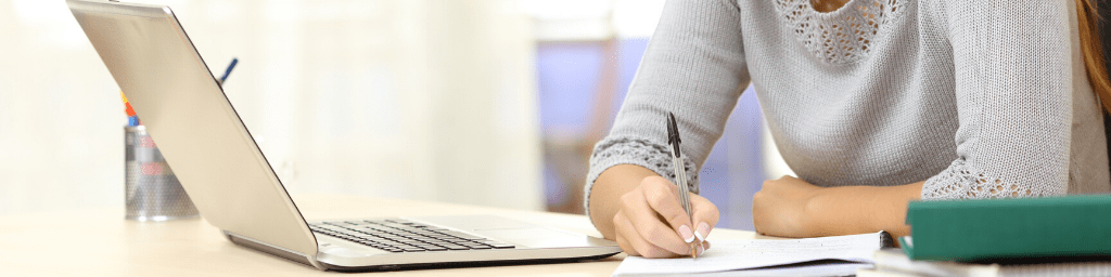 student-studying-with-laptop-and-notes