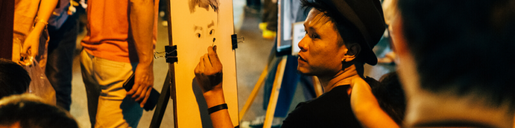 artist displaying live drawing skills