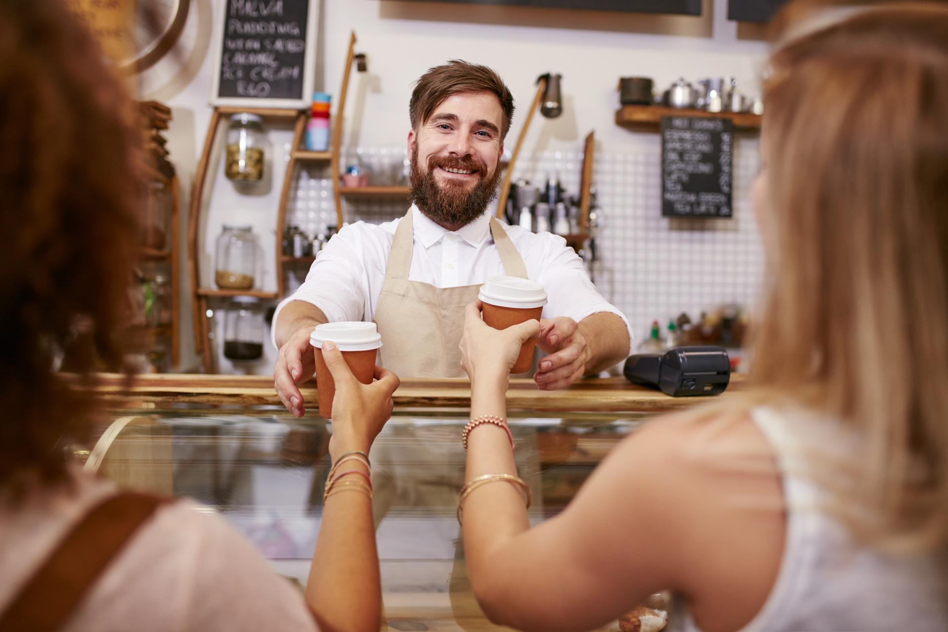 friendly-man-serving-coffee