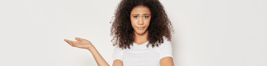 shrugging-young-woman