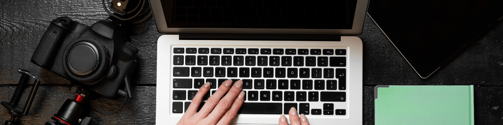 video-blogger-using-digital-camera-and-computer-for-content-creation