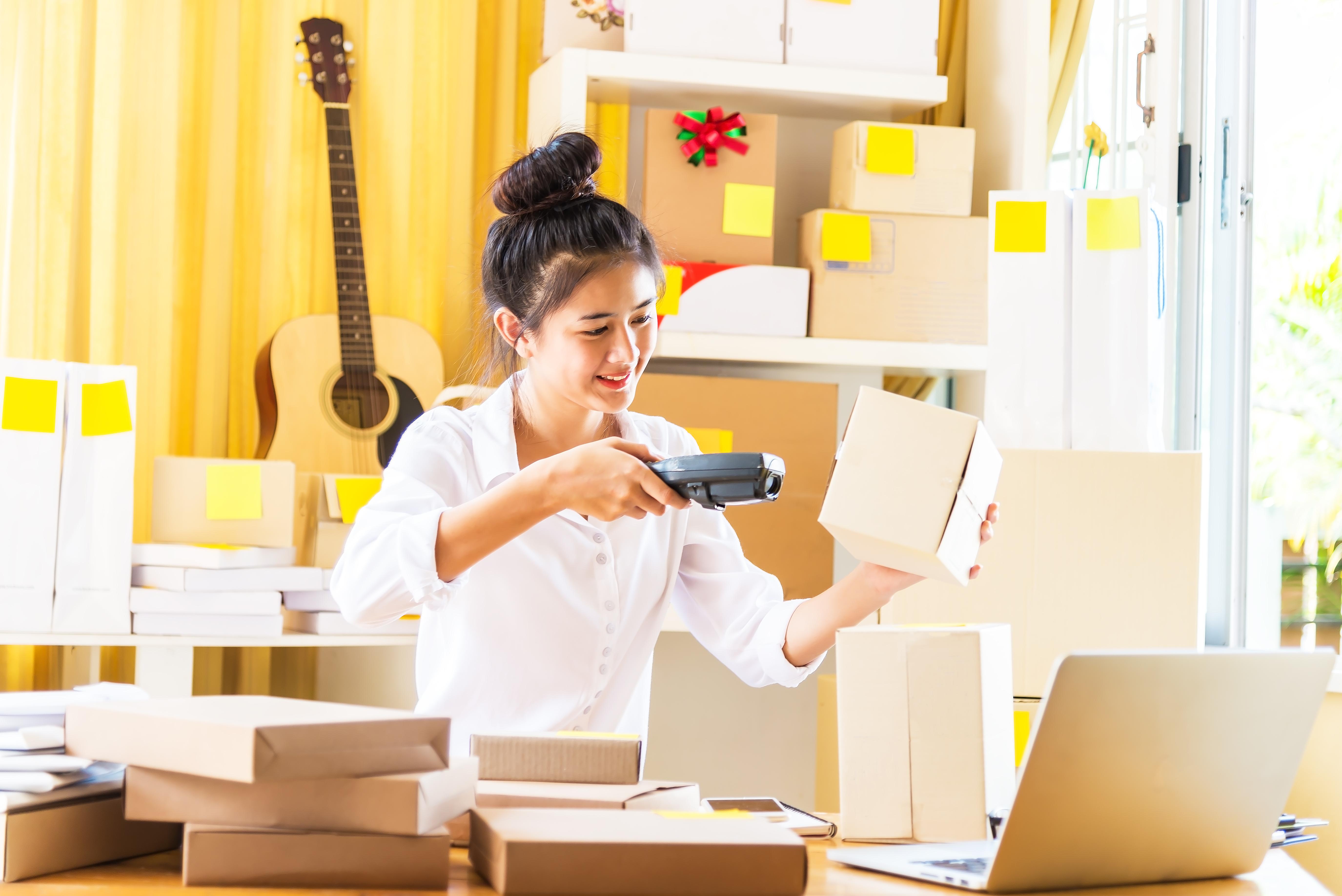 young-business-woman-working-online-shopping-at-her-home-lifestyle-for-working-at-home