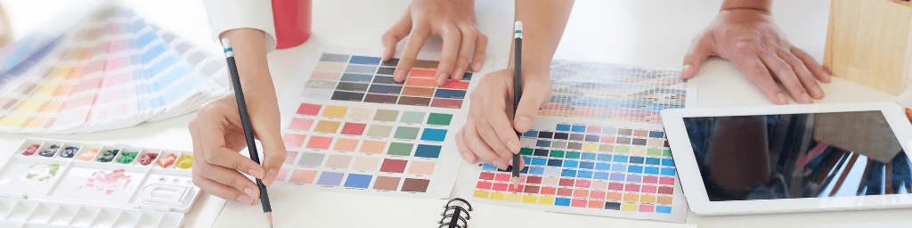 creative-graphic-designer-sketch-pencil-on-notebook-paper-with-pre-project-on-artist-workplace