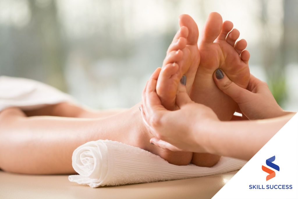 physical-therapist-aide-giving-advanced-reflexology