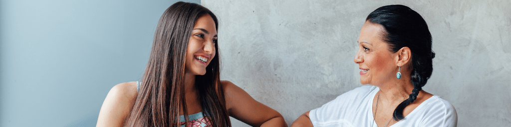 two-women-talking-in-cafe