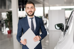 smiling car salesman