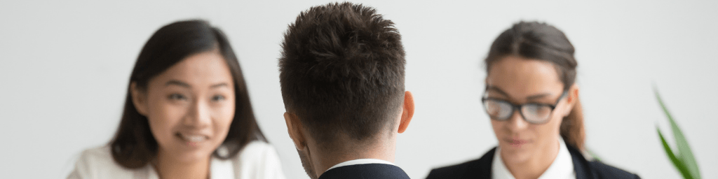male-candidate-interviewed-by-diverse-hr-team