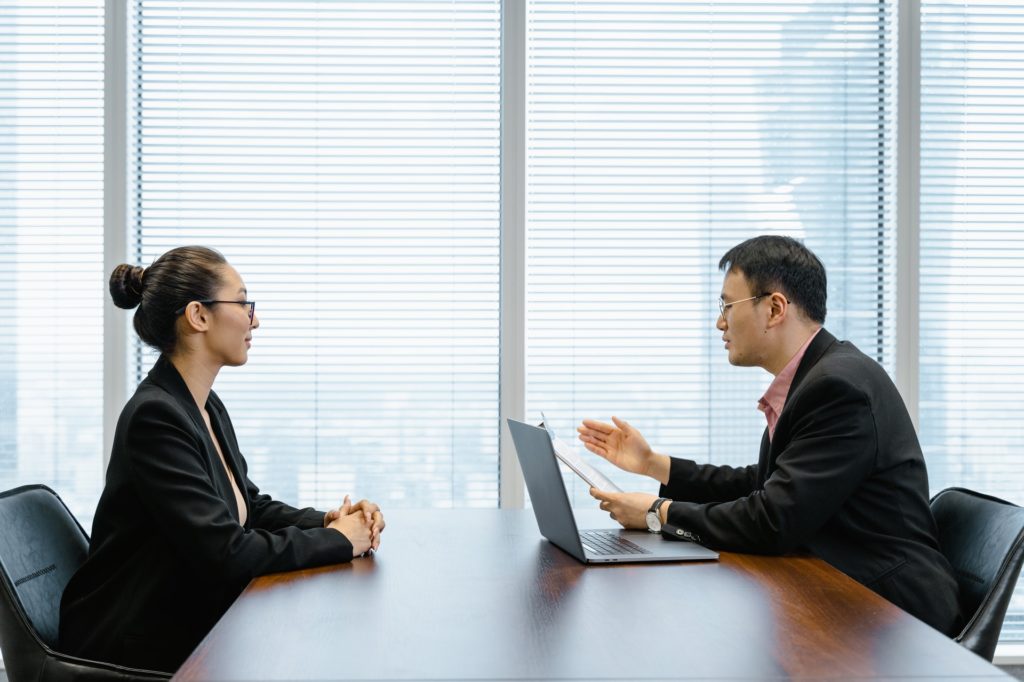 hiring manager interviewing job applicant