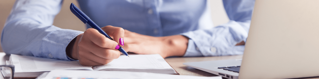 business-lady-in-office-writing-proposal-letter