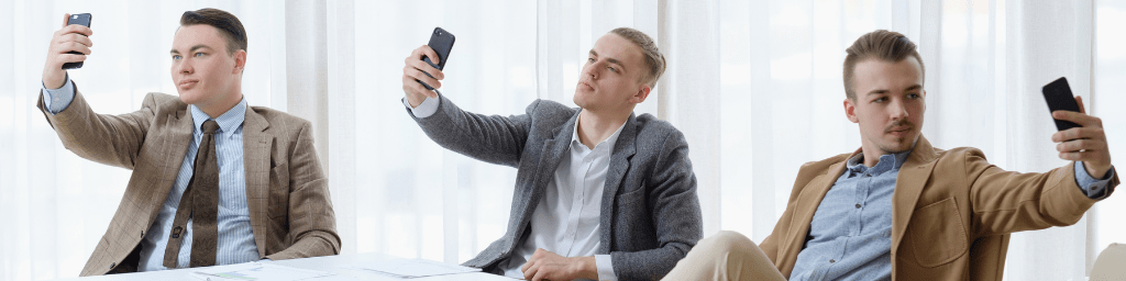 interview-attire-for-men-three-men-taking-selfie-while-sitting