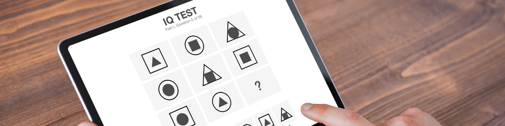 man-taking-iq-test-on-tablet