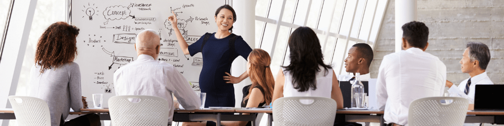pregnant-woman-discussing-soft-skills-in-the-boardroom