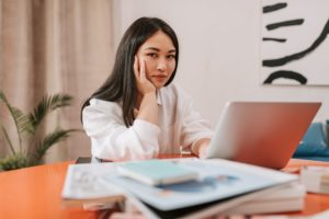 Female remote worker with laptop