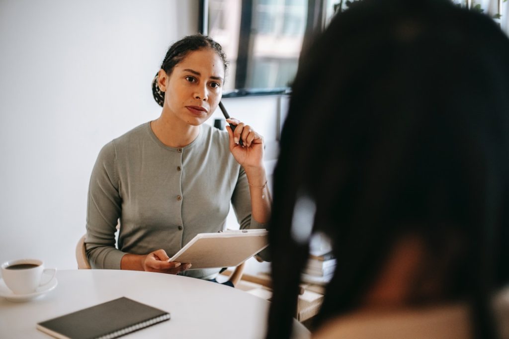 hiring manager listening to job seeker