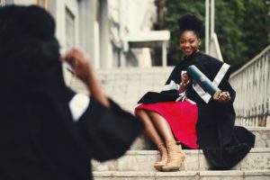 scholar in black toga graduation