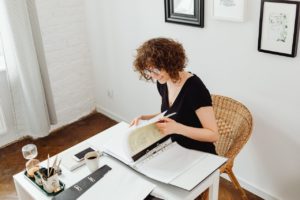 female accountant working on desk how to become an accountant