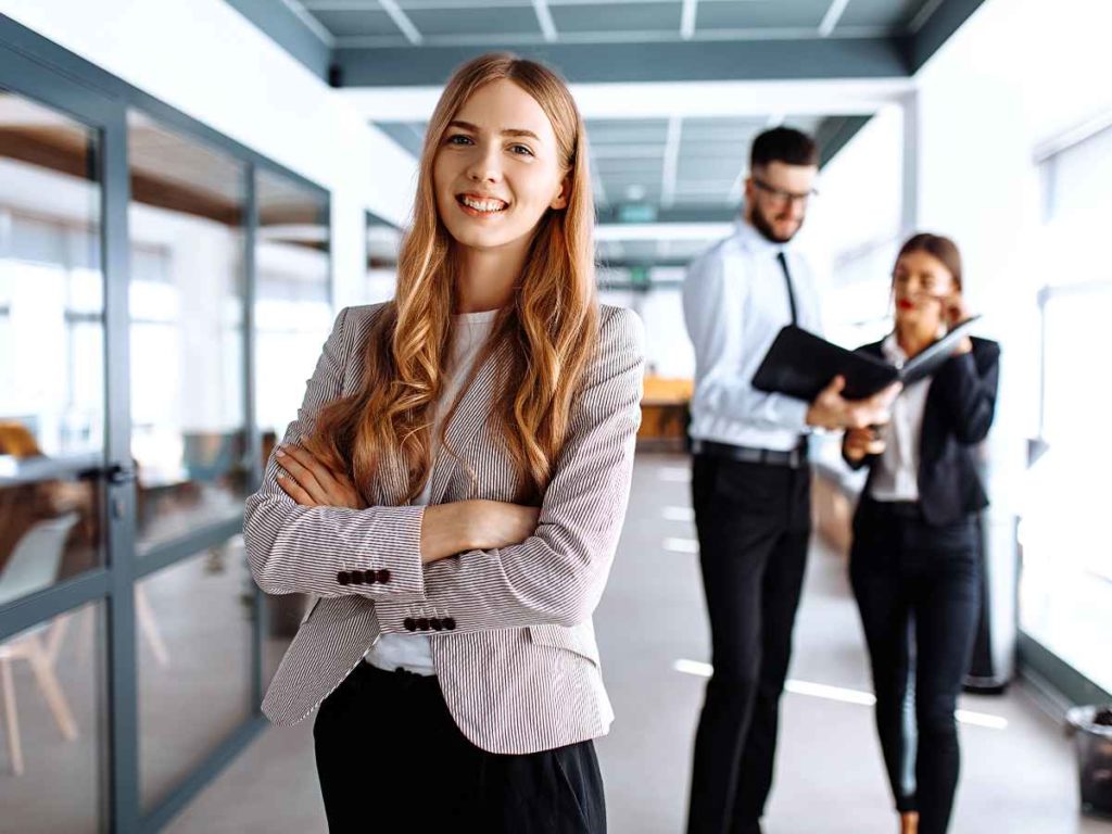 Career Gaps Woman In Office Light Brown Blazer