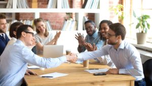 negotiation skills - two business men shaking hands