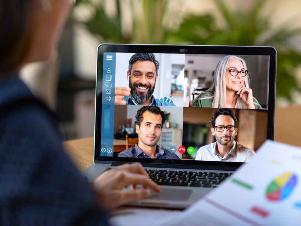 Remote Team Productivity - Meeting on Laptop