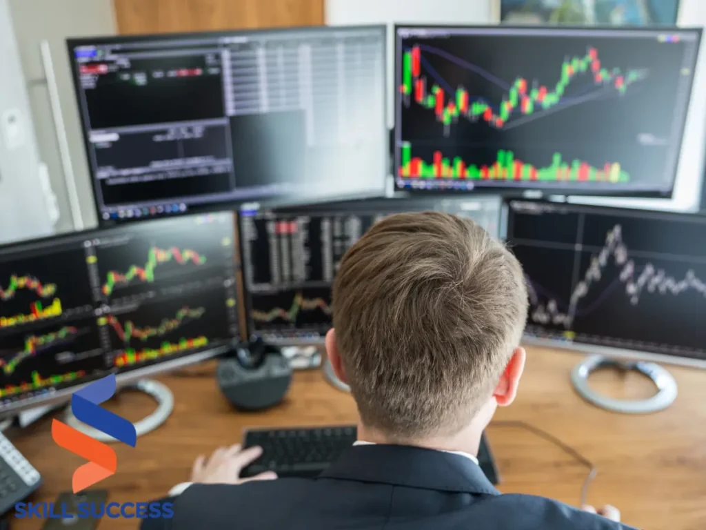 A man seated at a desk, focused on multiple computer screens displaying binary option candle charts