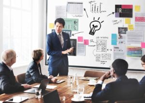 project manager talking in a meeting pitching new idea