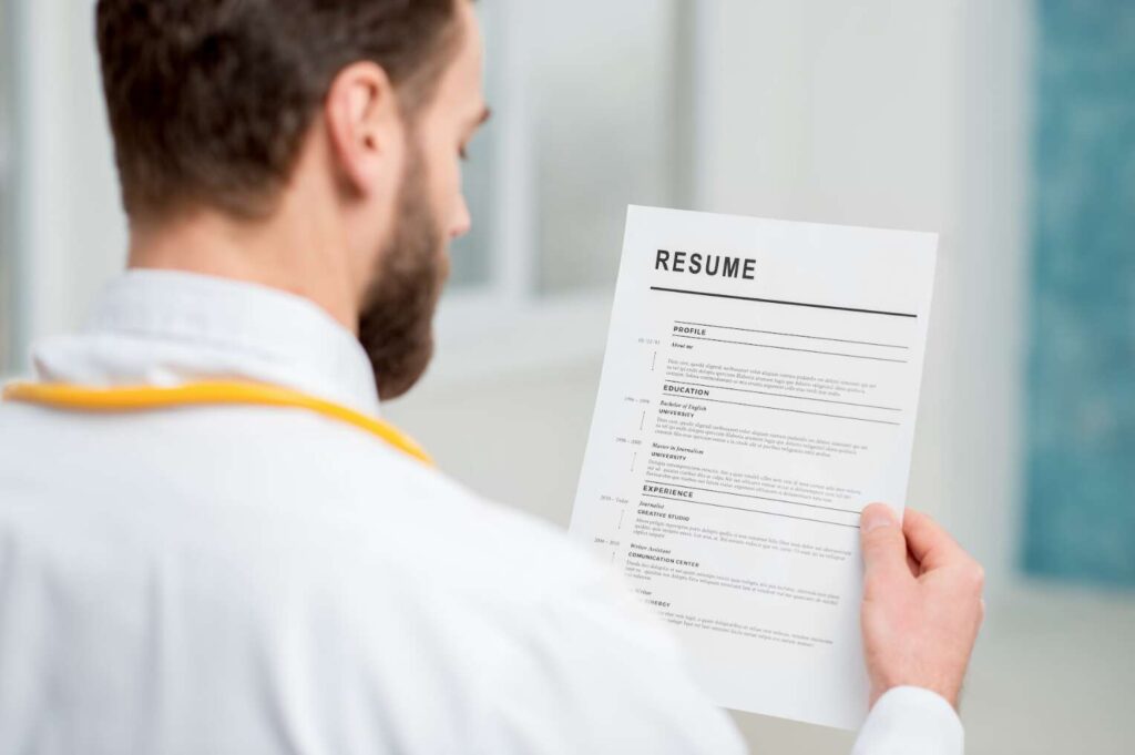 job recruiter looking at resume