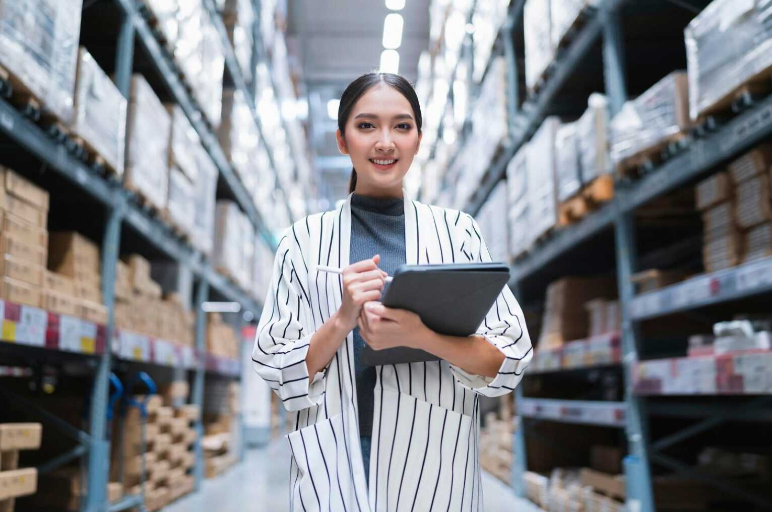 entrepreneur checking inventory in warehouse