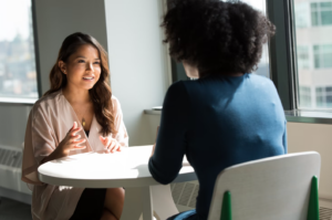 social work professional talking to another person