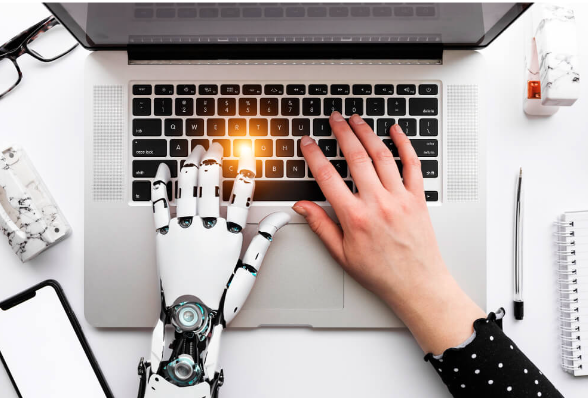 robot hand on a keyboard symbolizing ai skills