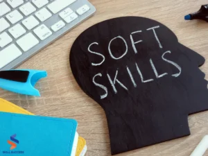 An image of a wooden human head model with soft skills written on it