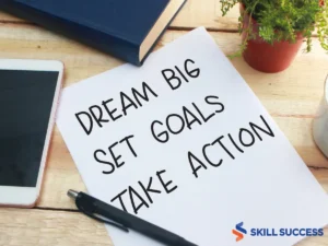 an image of a paper with words written 'dream big, set goals, take action;