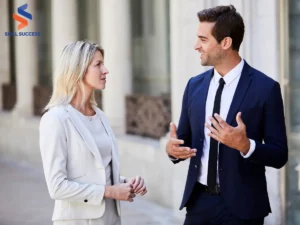 a man and a woman talking using verbal and nonverbal communication