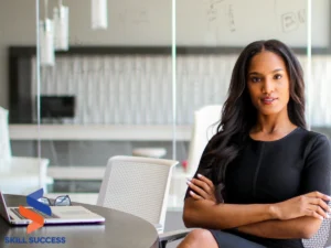 A business-suited woman at a table, illustrating the effectiveness of microlearning for professional development