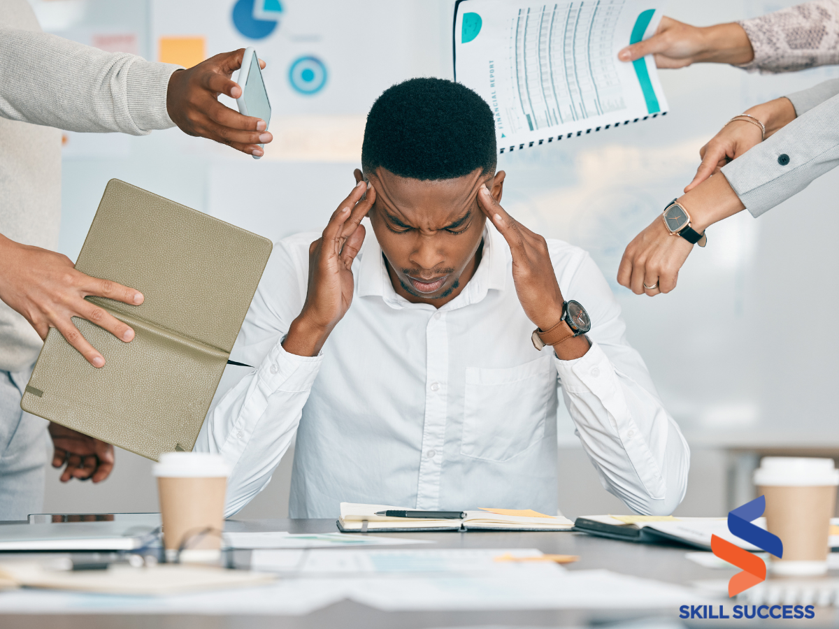 An employee trying to manage holiday stress