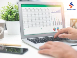 a laptop monitor showing excel budget sheet