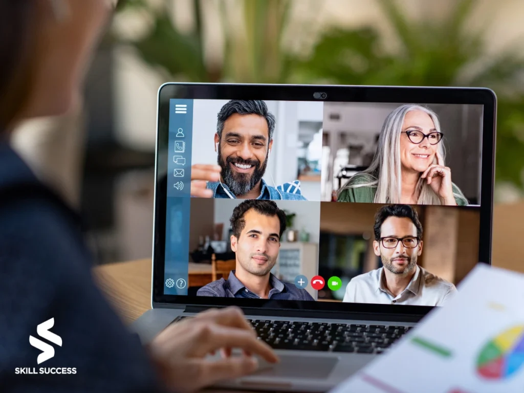 a screen showing people virtual meeting using skype