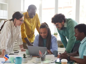 a team using a communication checklist on laptop