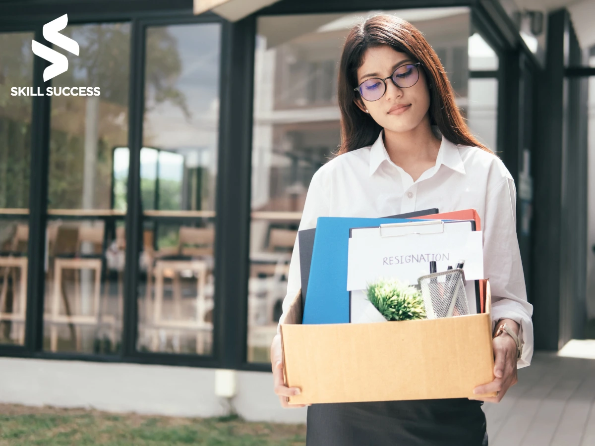 A young woman learning how to regain confidence after a layoff