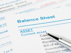 a paper with the text "balance sheet"