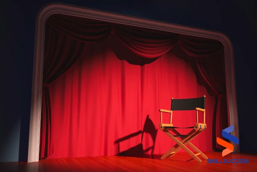 red curtain director's chair on stage